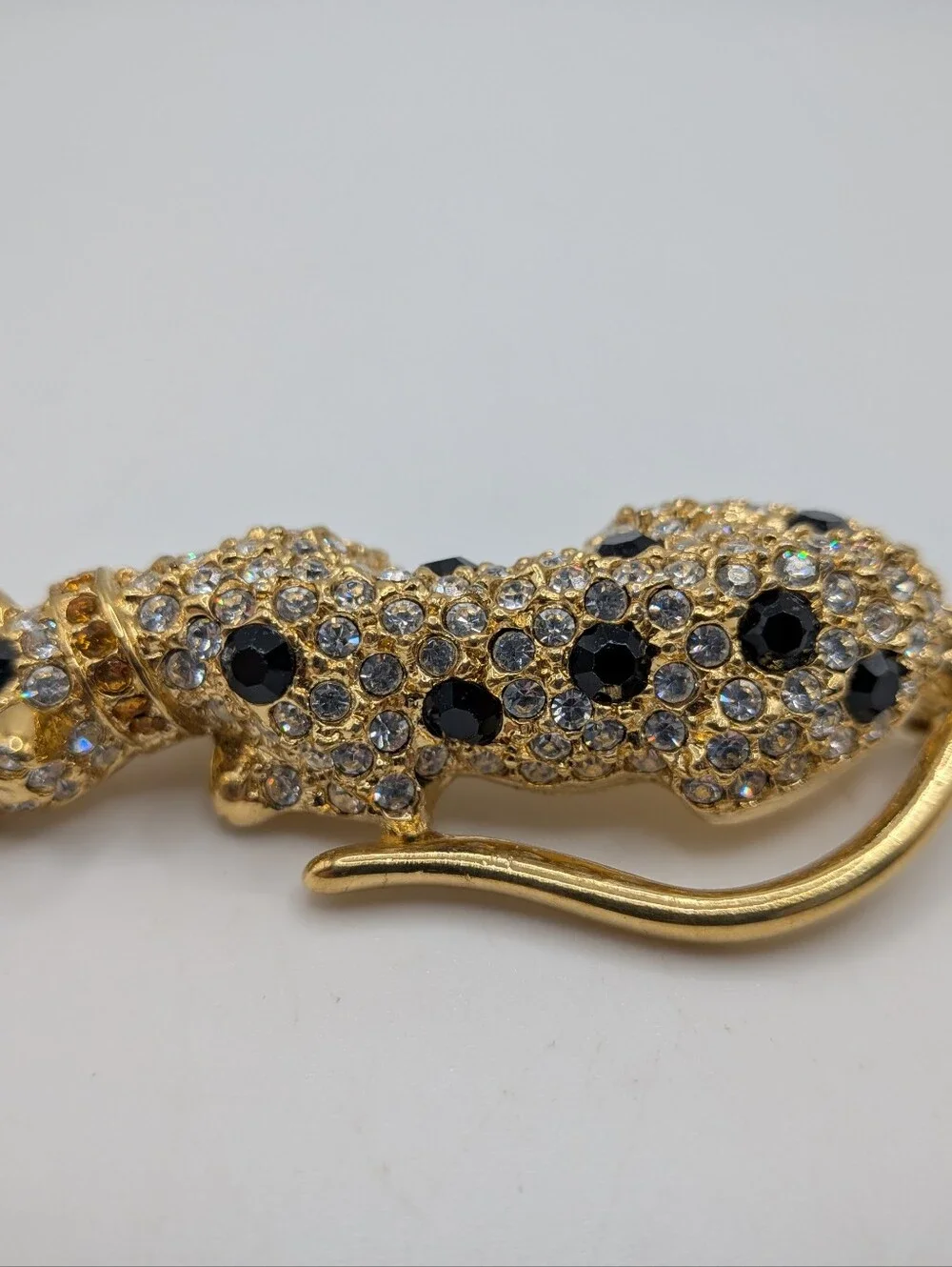 Giorgio Gold-Tone Leopard Brooch with Green and Black Stones